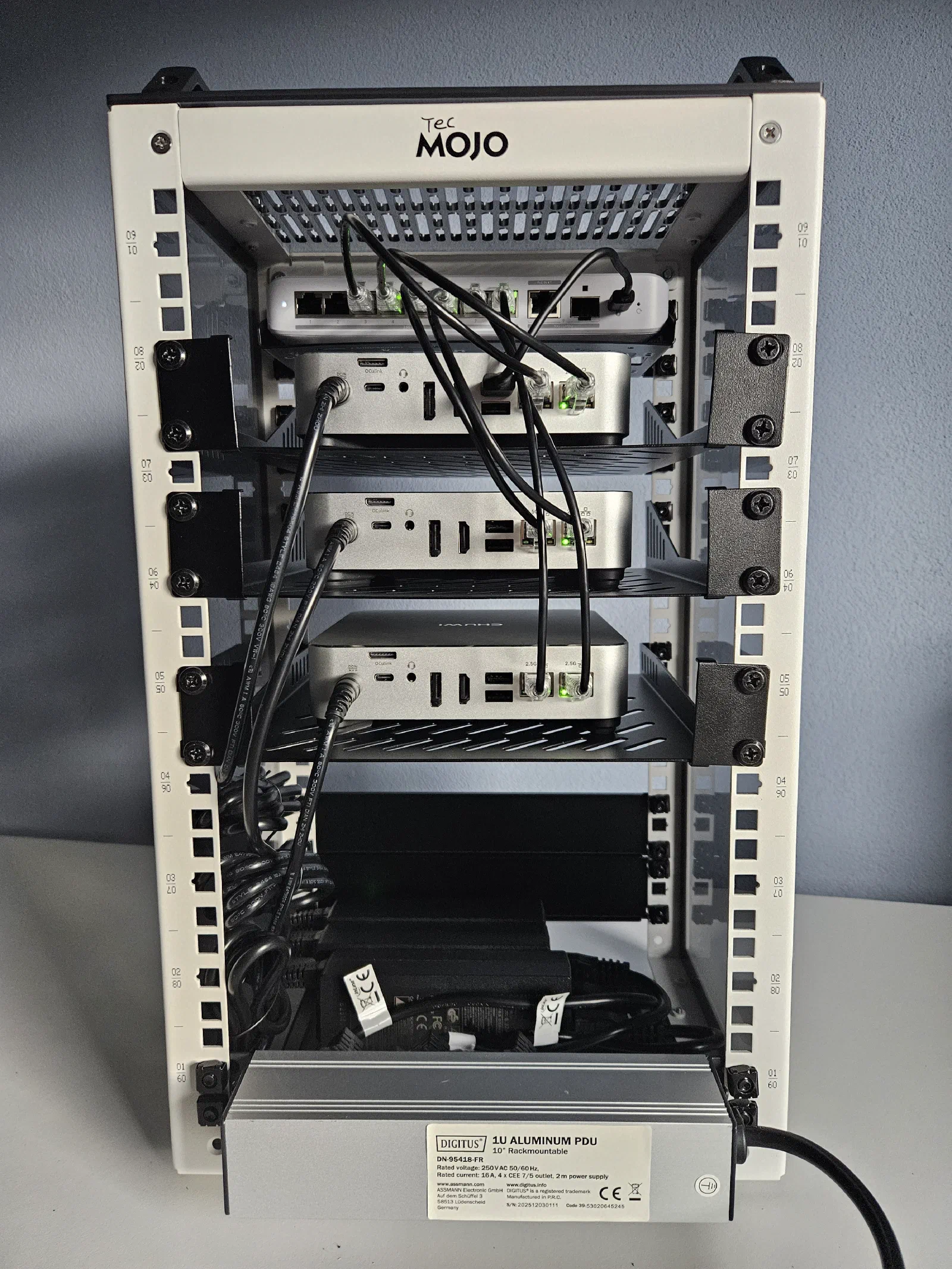 Homelab back view showing cable routing